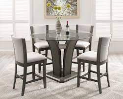 It is like home base in baseball. Crown Mark Camelia Grey Counter Height Glass Dining Set