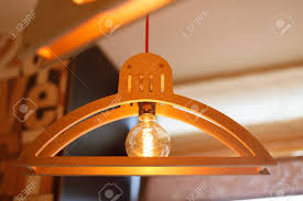 Looking for good quality ceiling light hanger at the lowest prices? The Creative Decoration Of A Wooden Hanger And A Glass Lamp Hangs Stock Photo Picture And Royalty Free Image Image 89130954