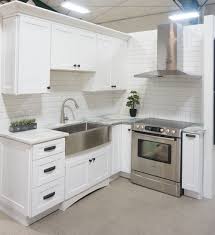 White Cabinets Shaker Door Style White Marble Countertops White Bevelled Su Shaker Style Kitchen Cabinets White Shaker Kitchen White Shaker Kitchen Cabinets