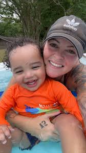 This is the cutest thing. Elijah walked in to ask a question as I was  feeding the baby. This was how my precious Buddy Love got my attention for  more!! Is that