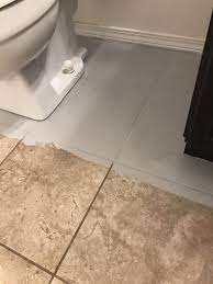To paint a tiled floor. How To Paint Tile Floors Arinsolangeathome Painting Tile Floors Painting Ceramic Tile Floor Painting Bathroom Tiles