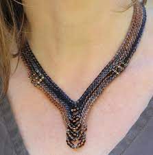 Maybe you would like to learn more about one of these? 7 Knitted Necklace Patterns For Quick Technique Practice Knitted Necklace Knit Jewelry Necklace Patterns