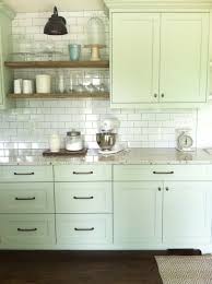 Light colored cabinets | kitchen magic's design blog is here to provide you with all of the latest trends and tips so you can create the kitchen of your you're sure to find your ideal kitchen cabinets in our extensive door gallery! Benjamin Moore Tea Light Painted Kitchen Cabinets Interiors By Color Light Green Kitchen Green Kitchen Walls Green Cabinets