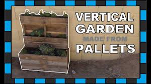 You'll want to make pockets deep enough to hold soil as you staple the fabric in place. How To Build A Vertical Garden Out Of An Old Pallet Youtube
