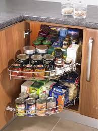 They may still be relatively deep, but at least the stuff is all on display when you open the cabinet doors. Simply Wood 1 2 Corner Carousel Set Corner Kitchen Cabinet Kitchen Cabinet Storage Kitchen Storage Solutions