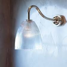 As the small bathroom above shows, adding a mirror across a whole wall can double the look and feel of the room. Bathroom Wall Lights Ip Rated