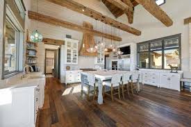 The texas hill country is one of few places around the world that has its own distinct style. A Fresh Farmhouse Designed With Reclaimed Timbers In Texas Hill Country Farmhouse Kitchen Design Country Kitchen Designs Farmhouse Style Kitchen