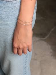 A bracelet is an article of jewellery that is worn around the wrist. Uhrgzt9axyl1xm