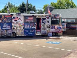 Trump RV in Edmond using the handicap space to sell stuff: classless. :  r/oklahoma