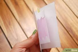 It's easiest to start folding from either the very top or very bottom score lines. How To Make A Birthday Cake Pop Up Card Robert Sabuda Method
