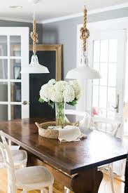 An Editorial Stylist Invites Us Inside Her Beautiful Coastal Home Rustic Dining Room Coastal Dining Room Dining Room Light Fixtures