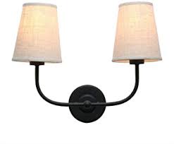 The counterweight wall sconce combines a clean silhouette with a mix of materials: Amazon Com Double Light Wall Sconce