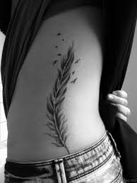 Bouquet of roses and a message. 81 Stunning Feather Tattoos On Rib