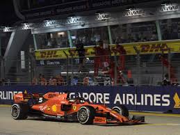 A general view of the podium celebrations with race winner sebastian vettel of germany and ferrari, second placed charles leclerc of monaco and ferrari and third placed max verstappen of netherlands and red bull racing during the f1 grand prix of singapore at marina bay street circuit on september 22, 2019 in singapore. Formula 1 Background 2019