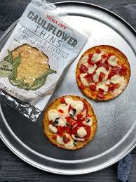Has trader joe's updated their instructions since i first purchased this pizza crust, or do some boxes have different instructions than others? We Tried Trader Joe S Cauliflower Thins Trader Joes Recipes Healthy Trader Joes Meal Planning Food