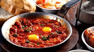 This Waterfront Mediterranean Enclave With Its Famous Flea Market Stone Lined Walkways And Artist Galleries Is A Rezepte Shakshuka Rezept Lebensmittel Essen