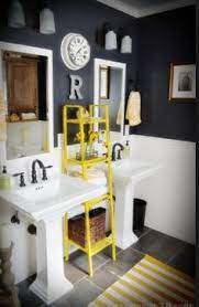 Designing your bathroom in orange color theme isn't that hard as designing in red theme but it could be challenging too. 19 Navy And Yellow Bathroom Ideas Yellow Bathrooms Bathroom Decor Yellow Bathroom Decor