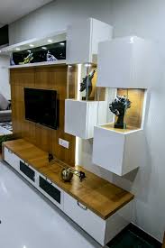 The design of the tv stand is very simple and elegant. Cutting Edge Design Studio Tv Unit Interior Designers