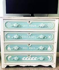 Stenciling is offering a wonderful craft projects for wood furniture painting to add a personal touch to room decor. 29 Dresser Makeover Ideas Coastal Beach Nautical Style Best Dressers Beach Furniture Beach Furniture Diy Dressers Makeover