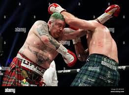 Jay McFarlane (left) and Nick Campbell in action during the Scottish  Heavyweight bout at the OVO Hydro, Glasgow. Picture date: Saturday February  26, 2022 Stock Photo
