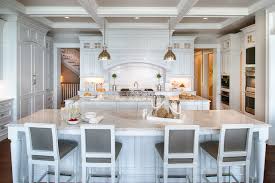 If you already have bold kitchen cabinetry, look to a contrasting wood finish to make your island stand out. 30 Kitchens That Prove The Value Of Double Islands The House Of Grace