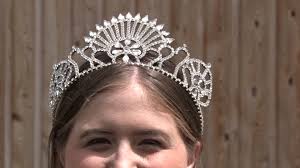 But what does the prolific crown emblem mean, and why was the artist so obsessed with it? Fair Queen Holds Crown For Longest Reign