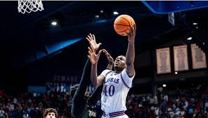 🏀 Flory Bidunga has 18 points, 10 rebounds as KU beats Towson