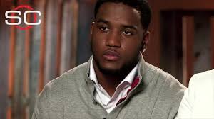 De'Andre Johnson apologizes for hitting woman, wishes he walked away