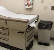 Examination table, paper over a pillow, an exam midmark 40 ...