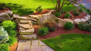 A low wall separates the patio from the pool and serves as small plant boxes. Cheap Landscaping Ideas Forbes Advisor