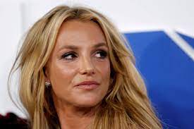 Britney spears fans hold signs outside a court hearing concerning the pop singer's conservatorship at the stanley mosk courthouse, march 17, 2021, in los angeles. Qsrhpsvg6kktum