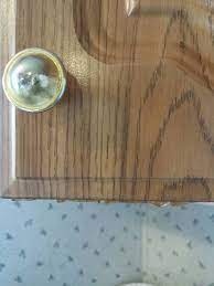 Sand the veneer to create texture on the surface of the furniture. How To Paint Peeling Paper Covered Cabinets Kitchen Cabinet Remodel Mobile Home Kitchen Cabinets Painting Kitchen Cabinets