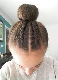 My Go To Hairstyle 2 Dutch Braids Into A High Bun Dutch Braid Bun Braided Hairdo Braids