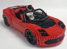 Lego Elon Musk S Tesla Roadster And Starman Prepared For Launch The Brothers Brick Tesla Roadster Lego Lego Wheels