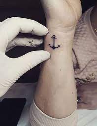 21 Best Small And Minimalist Tattoos That Are Absolutely Adorable Minimalist Tattoo Small Anchor Tattoos Wrist Tattoos For Women