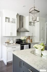 Zodiaq quartz, coarse carrara with eased edge and detailed corners. White And Grey Kitchen A Hardware Update Citrineliving