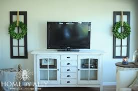 New Windows In The Sunroom And Decorating Around The Tv Decor Around Tv Tv Decor Tv Wall Decor