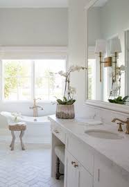 Black And White Modern Farmhouse Bathroom Black White Modern Farmhouse Meets Classic Tudor Style In Arizona Hello Lovely In 2020 Classic White Bathrooms White Bathroom Designs Modern Farmhouse Bathroom