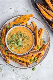 Fried sweet potato fries with spicy sweet potato fries dipping saucemy turn for us. Crispy Baked Sweet Potato Fries With Chipotle Dipping Sauce The Roasted Root