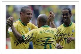 When he was 11, he was already busy playing football and training, so he dropped out. Ronaldinho Roberto Carlos Ronaldo Brazil Autograph Signed Photo Print Soccer Ebay