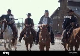 THE OLD WAY, Beau Linnell (center left), Abraham Benrubi (center right),  Noah Le Gros (right), 2023. © Saban Films