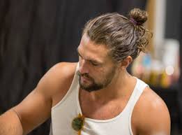 longer hair for men has become mainstream and with it came the man bun what is a man bun well it s a man bun styles long hair styles men jason momoa