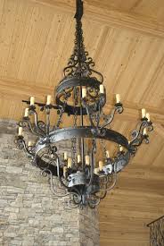 Features textured resin and wrought iron construction that contrasts nicely with six prominent candelabra bulbs. Large Rustic Chandeliers Ideas On Foter