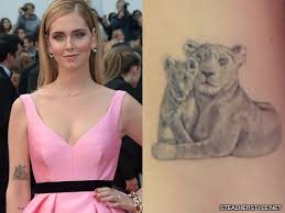 This tattoo relates to another lion tattoo that she has on the back of her arm. Chiara Ferragni S 26 Tattoos Meanings Steal Her Style