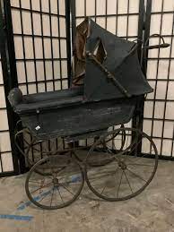Sold Price Antique Baby Buggy Doll Carriage With Metal Frame And Wooden Handle Carriage Cover Shows Wear January 6 0120 12 00 Pm Pst