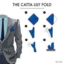 Pinch the middle of the square with a tiny object or press the continue to twist until you reach the desired size and fullness. 86 Pocket Squares Ideas Pocket Square Folds Pocket Square Pocket Square Styles