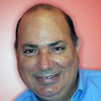 Towards a Drone Cinematographer: Guiding Quadrotor Cameras using Visual  Composition Principles