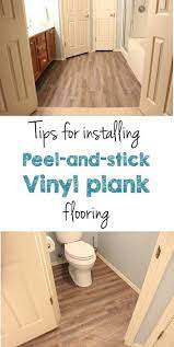 Peel And Stick Vinyl Plank Flooring Diy Sprinkled With Sawdust Plank Flooring Diy Diy Flooring Vinyl Plank Flooring