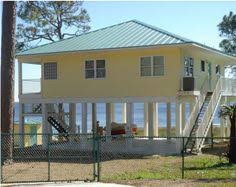 10 Beach Houses Pilings Ideas House House On Stilts Beach House Plans
