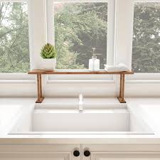 White open kitchen shelves with prety corbels painted white above my 100 year old cast enamel kitchen sink and diy do it yourself sink base out of barn replacing my barnwood shelf with open shelves in my kitchen. Over The Kitchen Sink Storage Ideas Apartment Therapy